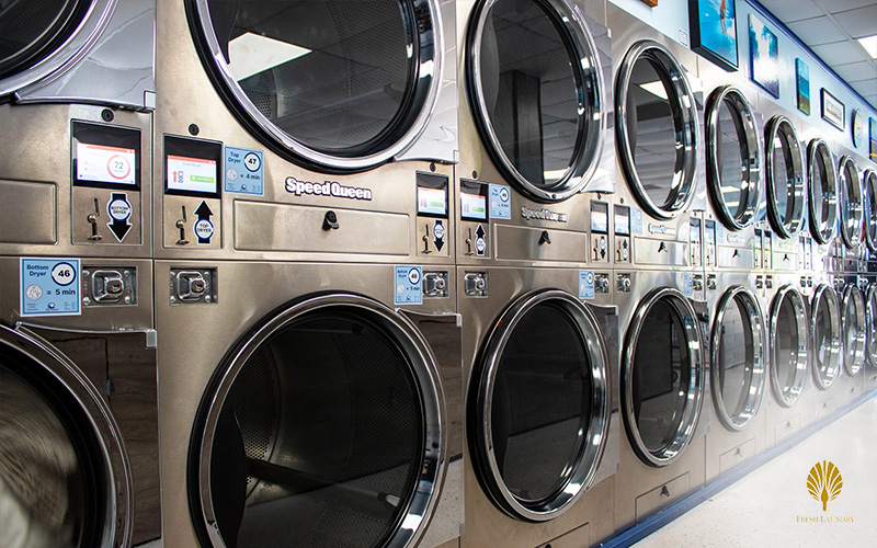 woman-looking-at-the-laundromat